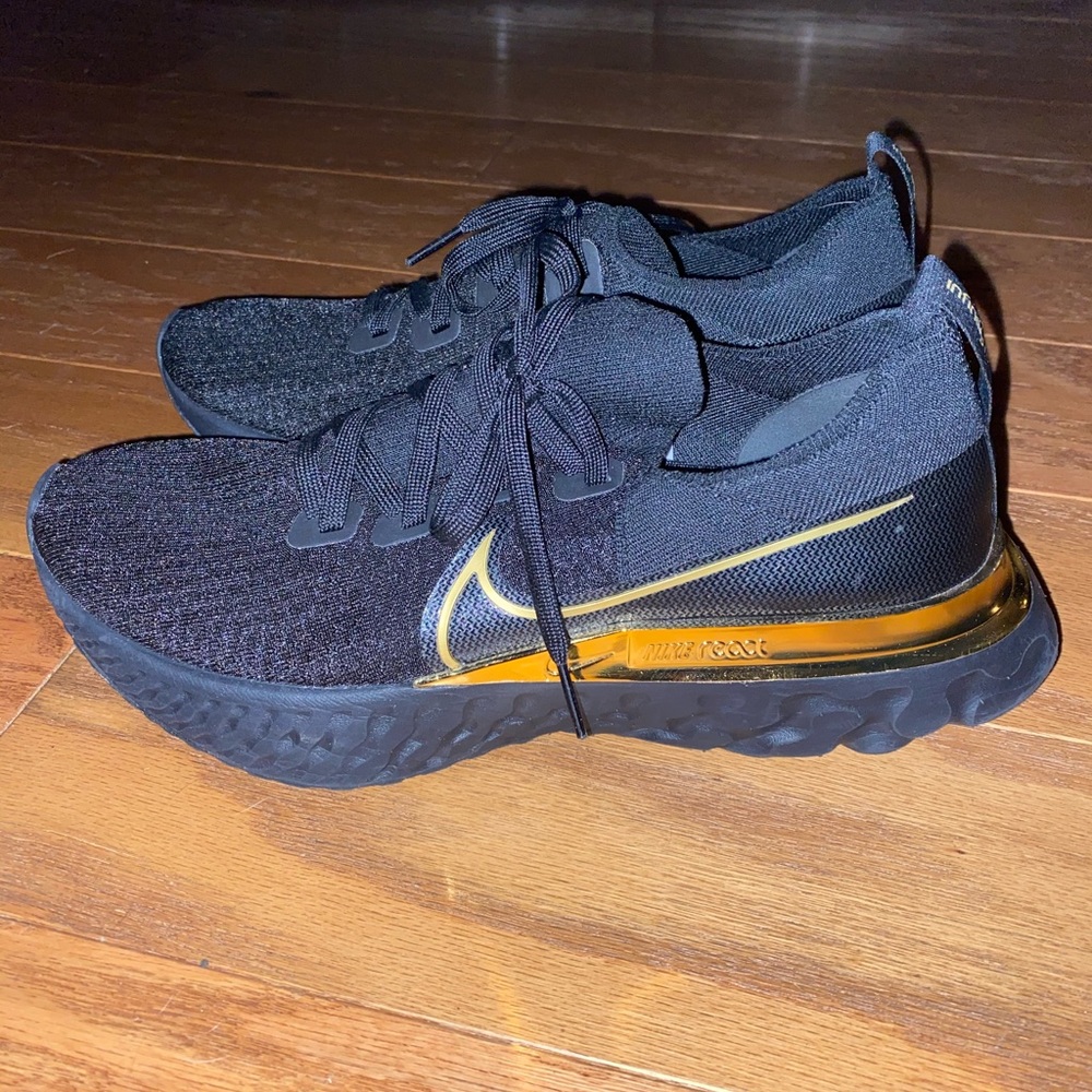 Nike React black and gold women’s size 10